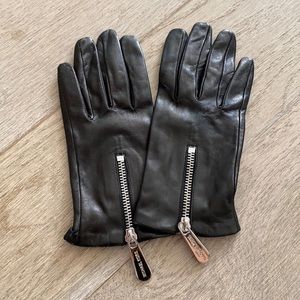 Black leather Michael Kors gloves. Worn once. Perfect condition!
